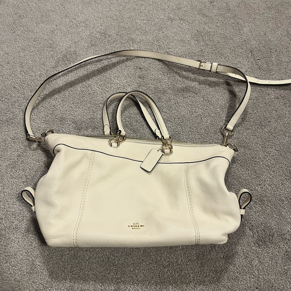 White leather Coach purse with side straps